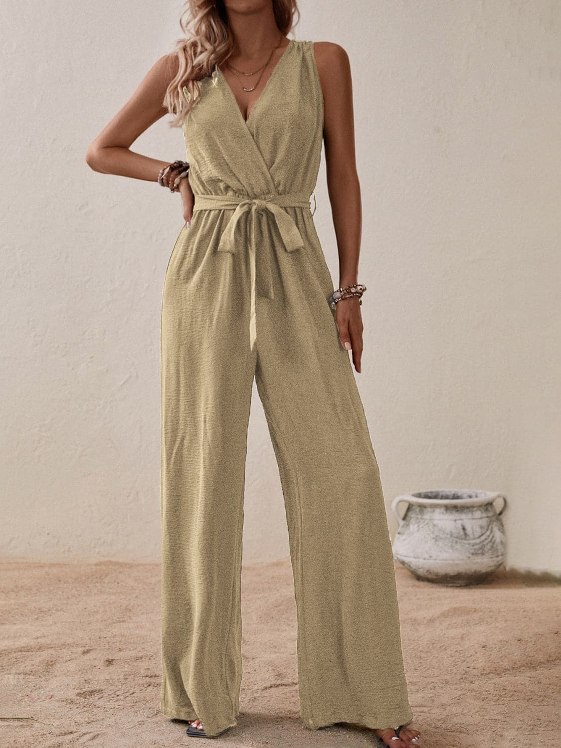 Tied Surplice Sleeveless Wide Leg Jumpsuit.