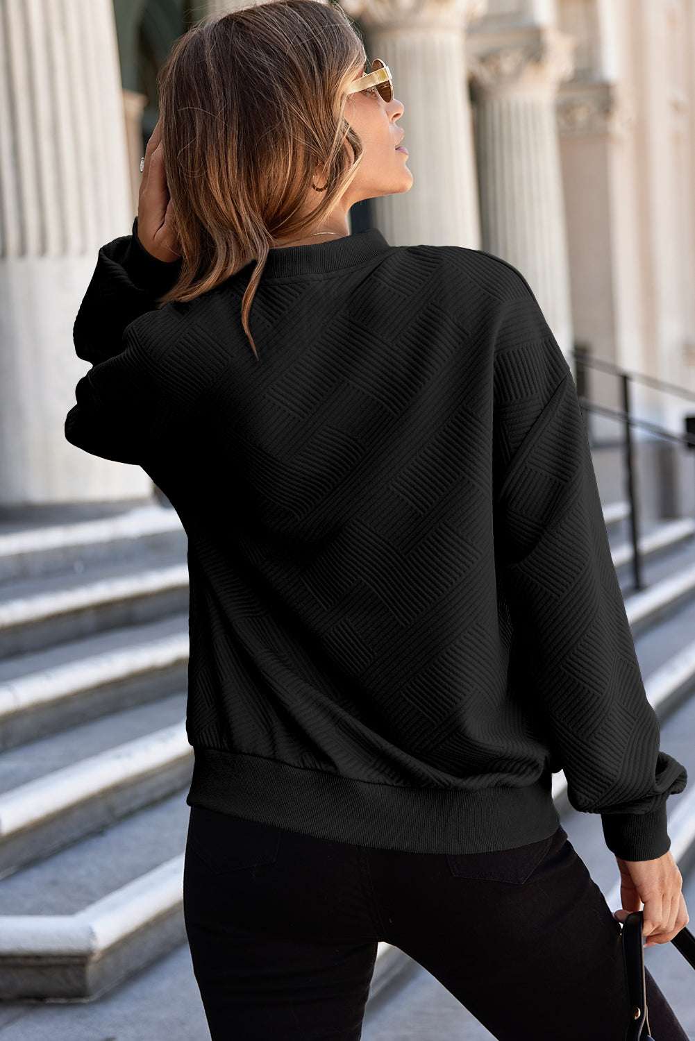 Sleek black bomber jacket with stand neck