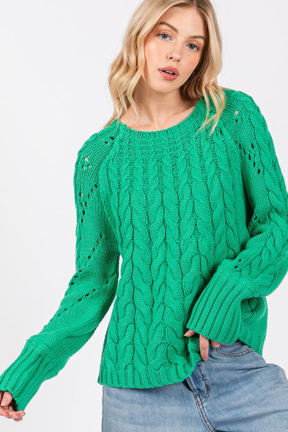 Cozy cable knit oversized sweater with boat neckline