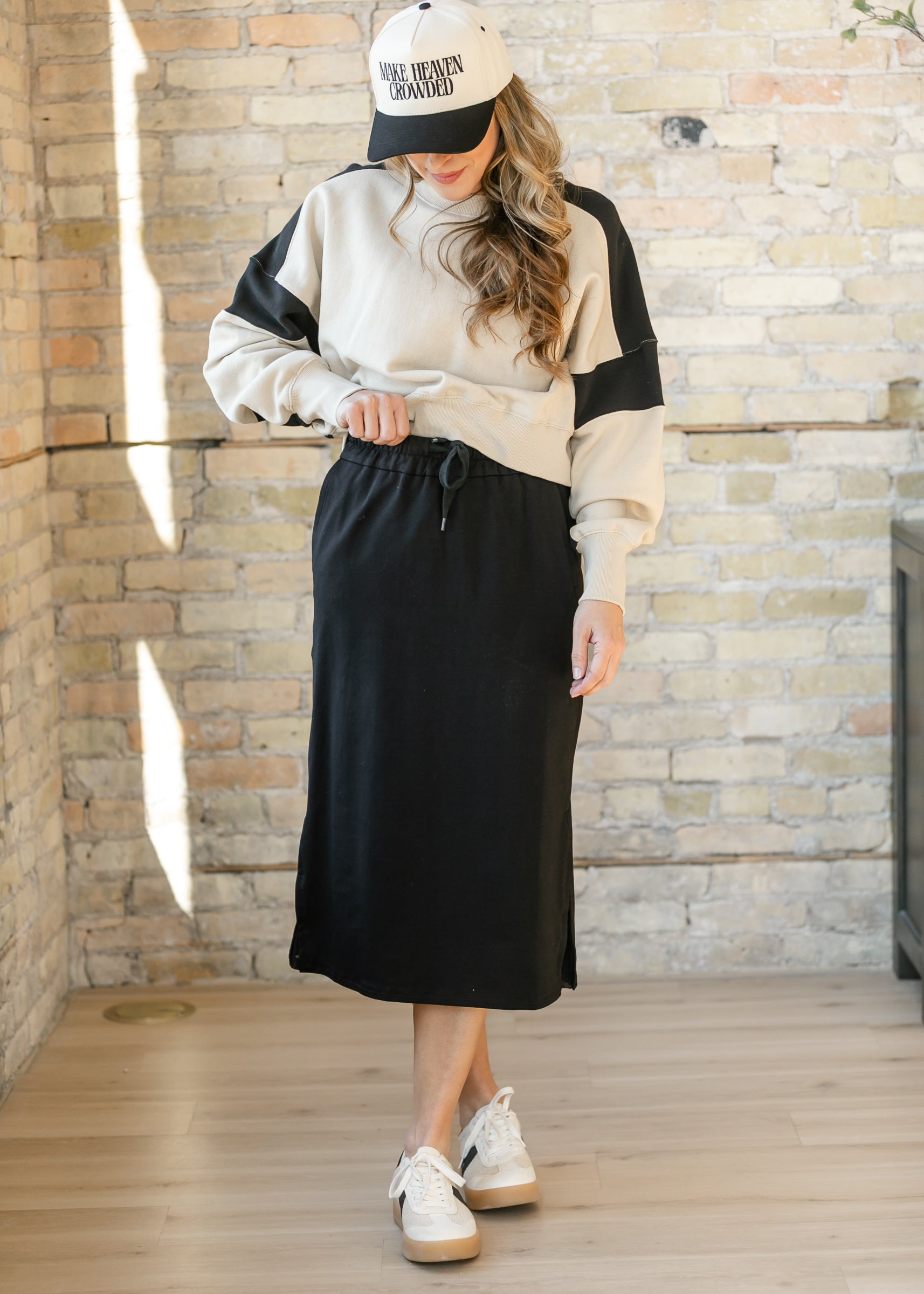 Inherit Co. Abbie Mesh Detail Knit Midi Skirt, displaying the flattering back view and comfortable, versatile fit.