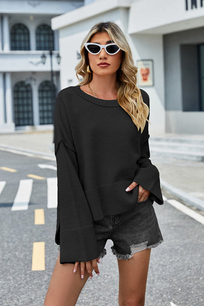 High-Low Slit Round Neck Long Sleeve Sweater.