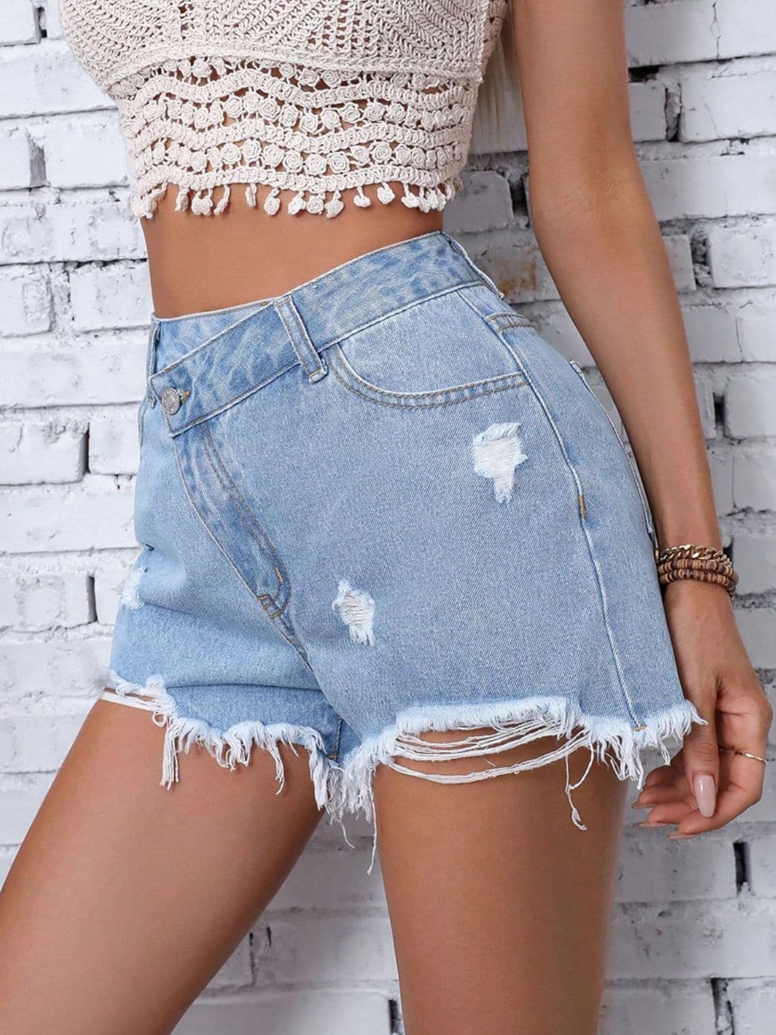 Distressed Raw Hem Denim Shorts.