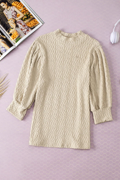 Textured Mock Neck Three-Quarter Sleeve Top.