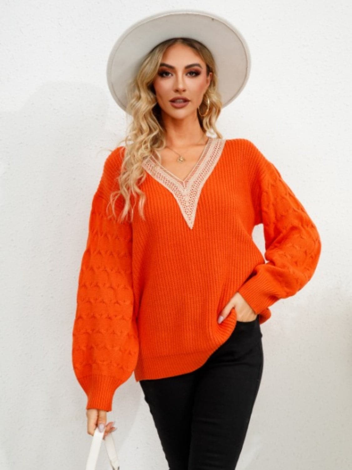 Dropped shoulder v-neck sweater with long sleeves