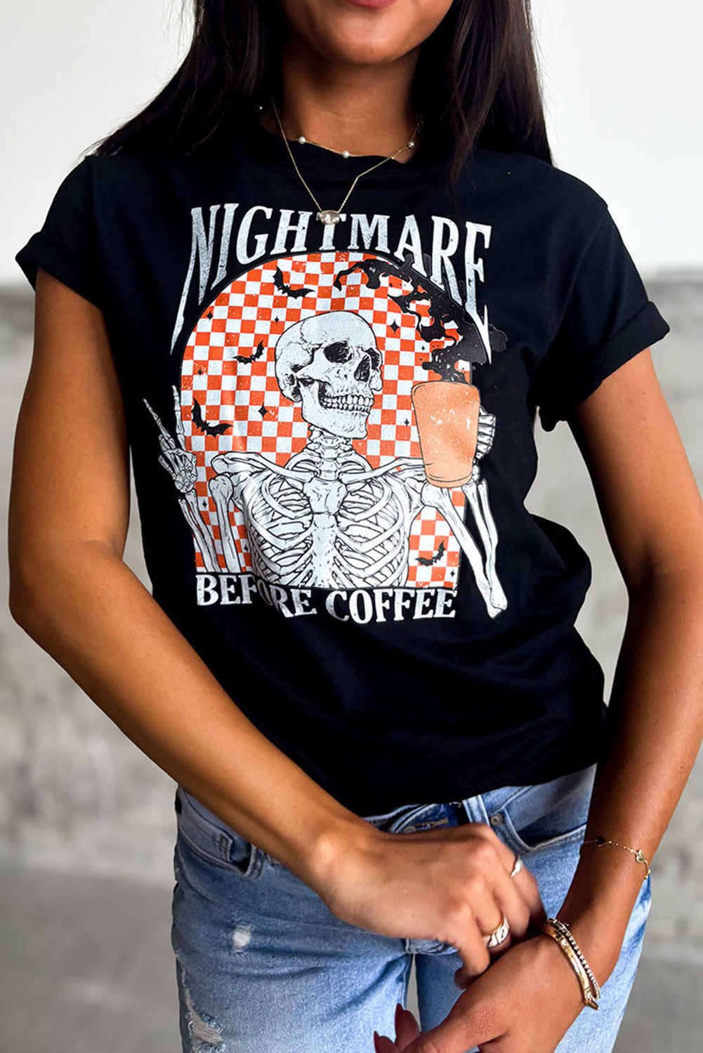 Chilling skull and checkerboard Halloween graphic tee