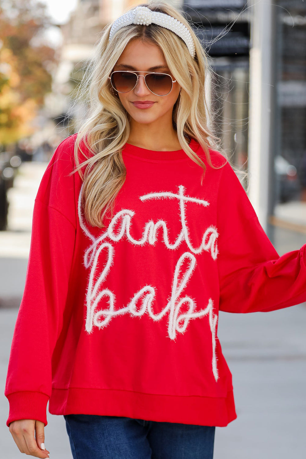 Festive red Santa baby tinsel graphic cozy sweatshirt