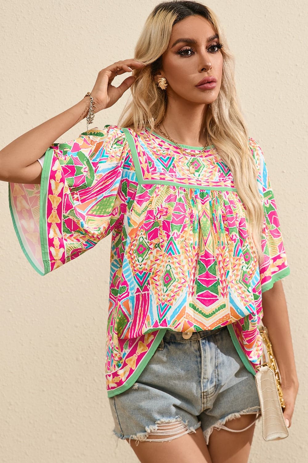 Printed Round Neck Half Sleeve Blouse.