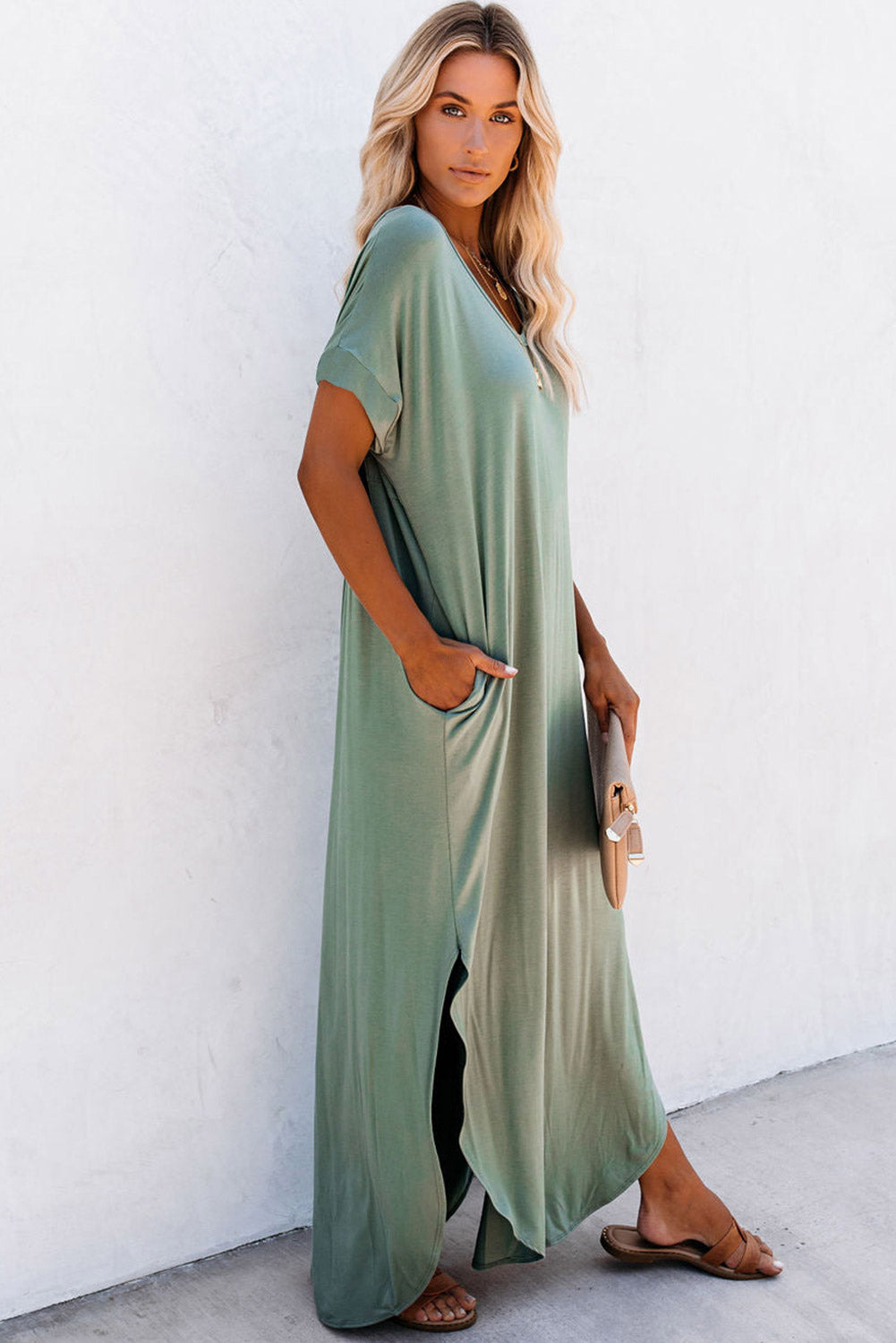 Elegant grass green maxi t-shirt dress with hidden pockets and stylish splits