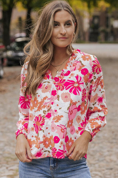 Floral V-Neck Frill Long Sleeve BlouseFloral V-Neck Frill Long Sleeve Blouse
 Indulge in elegance with our Floral V-Neck Frill Long Sleeve Blouse, a versatile piece that seamlessly combines sophisticatioLove Salve -Neck Frill Long Sleeve BlouseBlouses