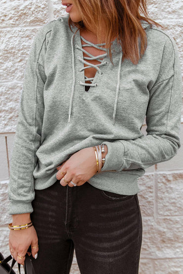 Lace-Up Dropped Shoulder Hoodie.