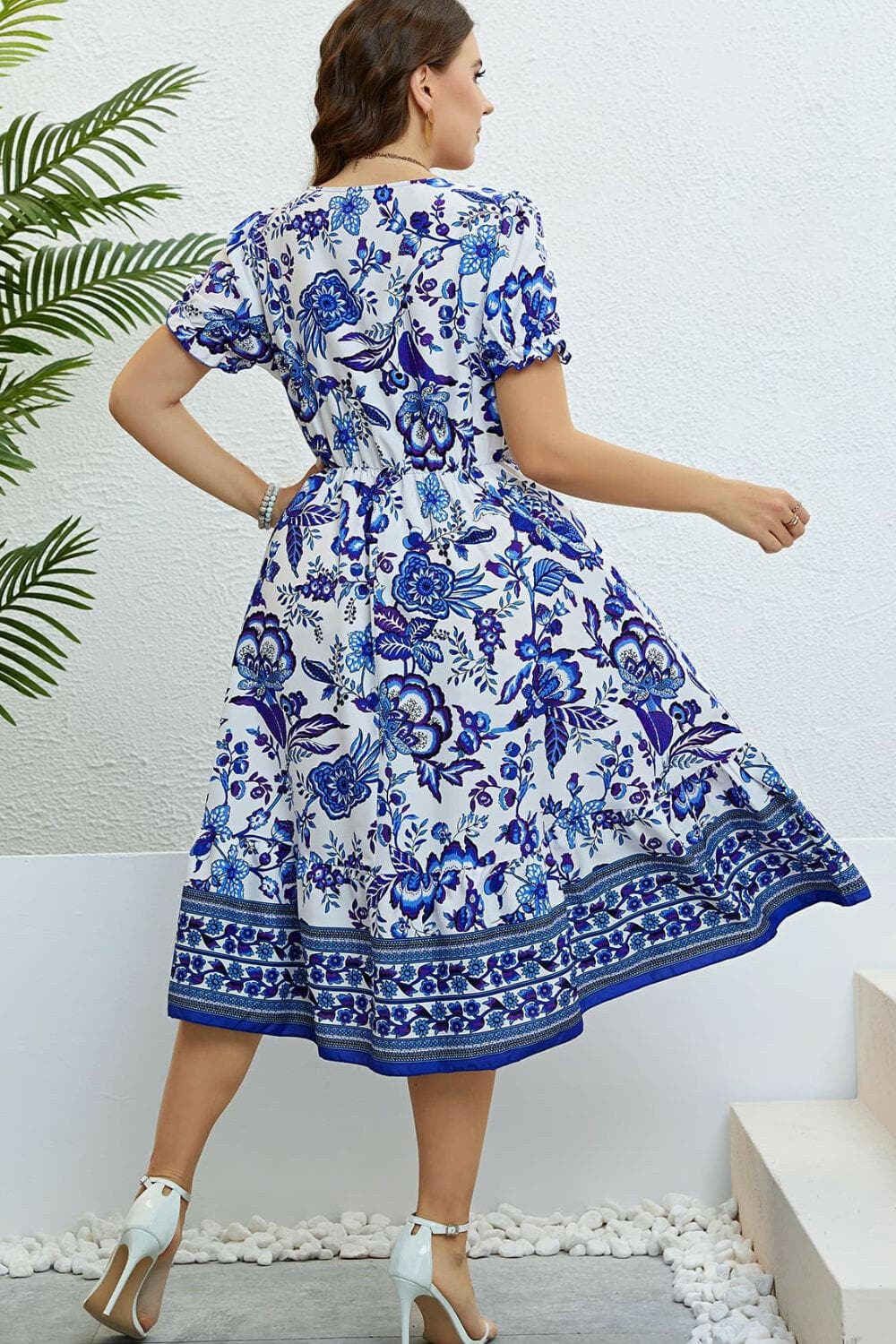 Floral Flounce Sleeve Surplice Dress.