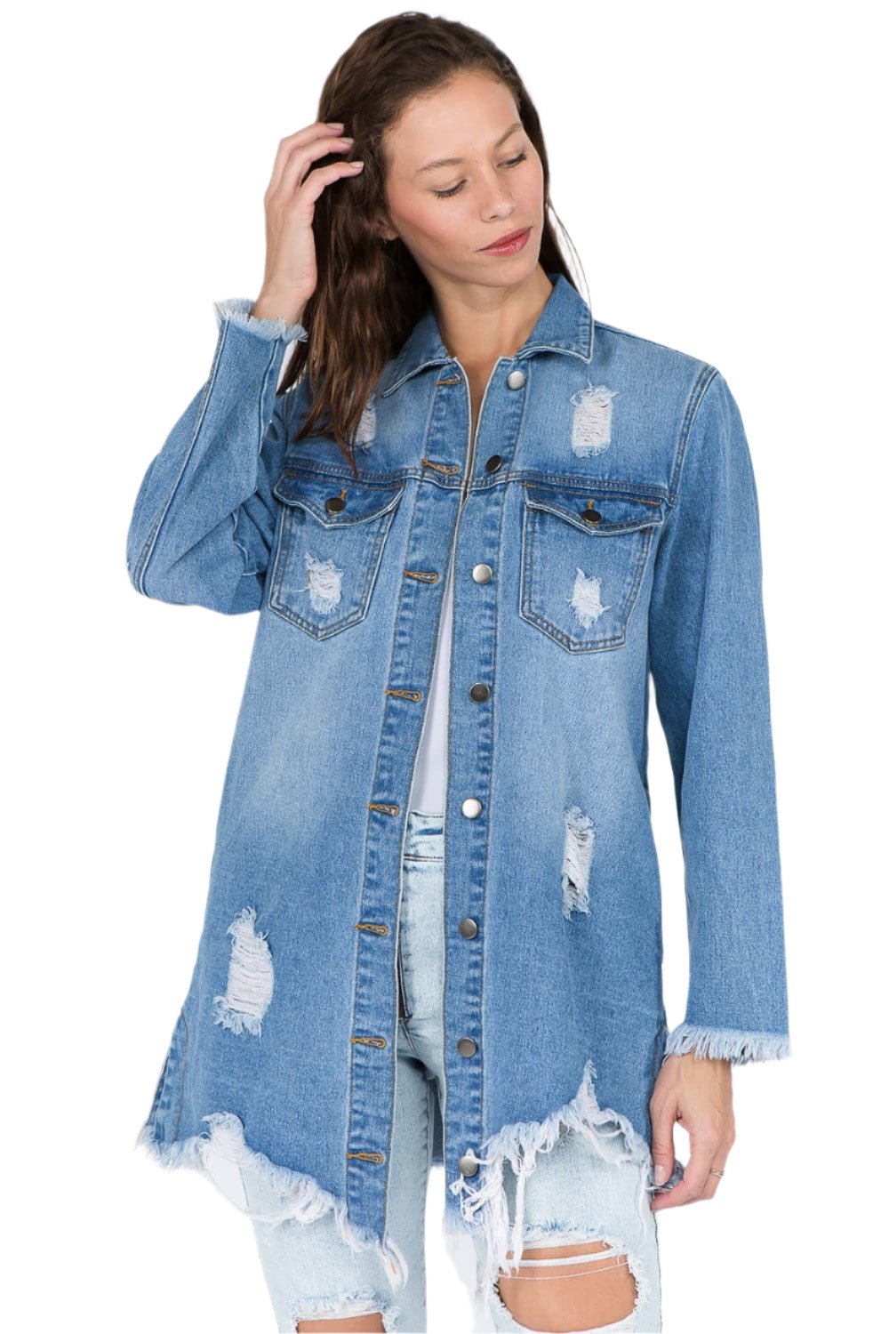 Distressed denim jacket with frayed hem for a vintage vibe