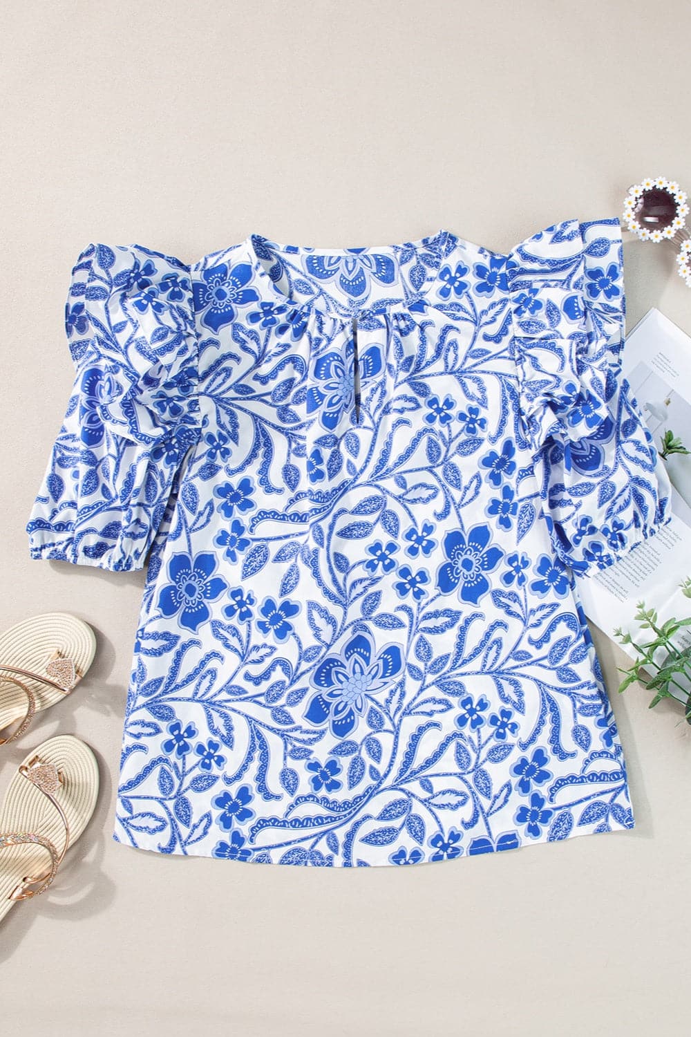 Printed Notched Half Sleeve Blouse.