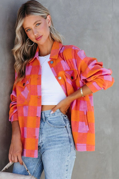 Orange plaid button-up jacket with chest pockets and turn-down collar