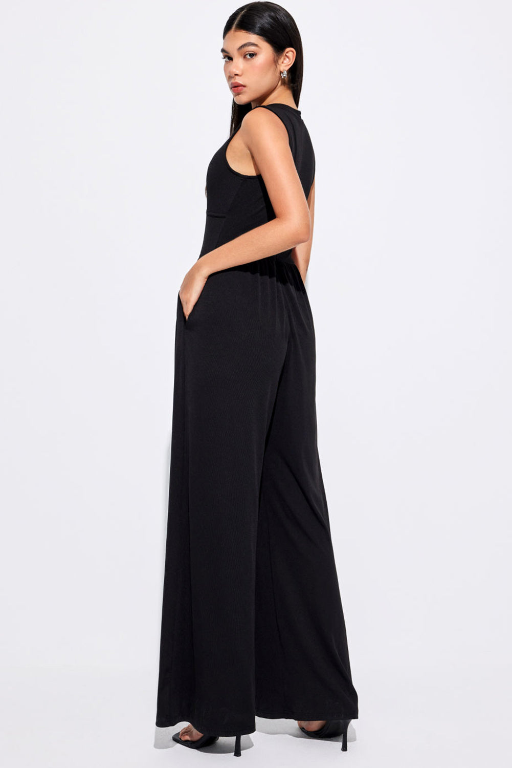 Chic black sleeveless jumpsuit with cinched waist and wide legs