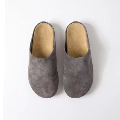 Suede slip-on flats with a round toe design