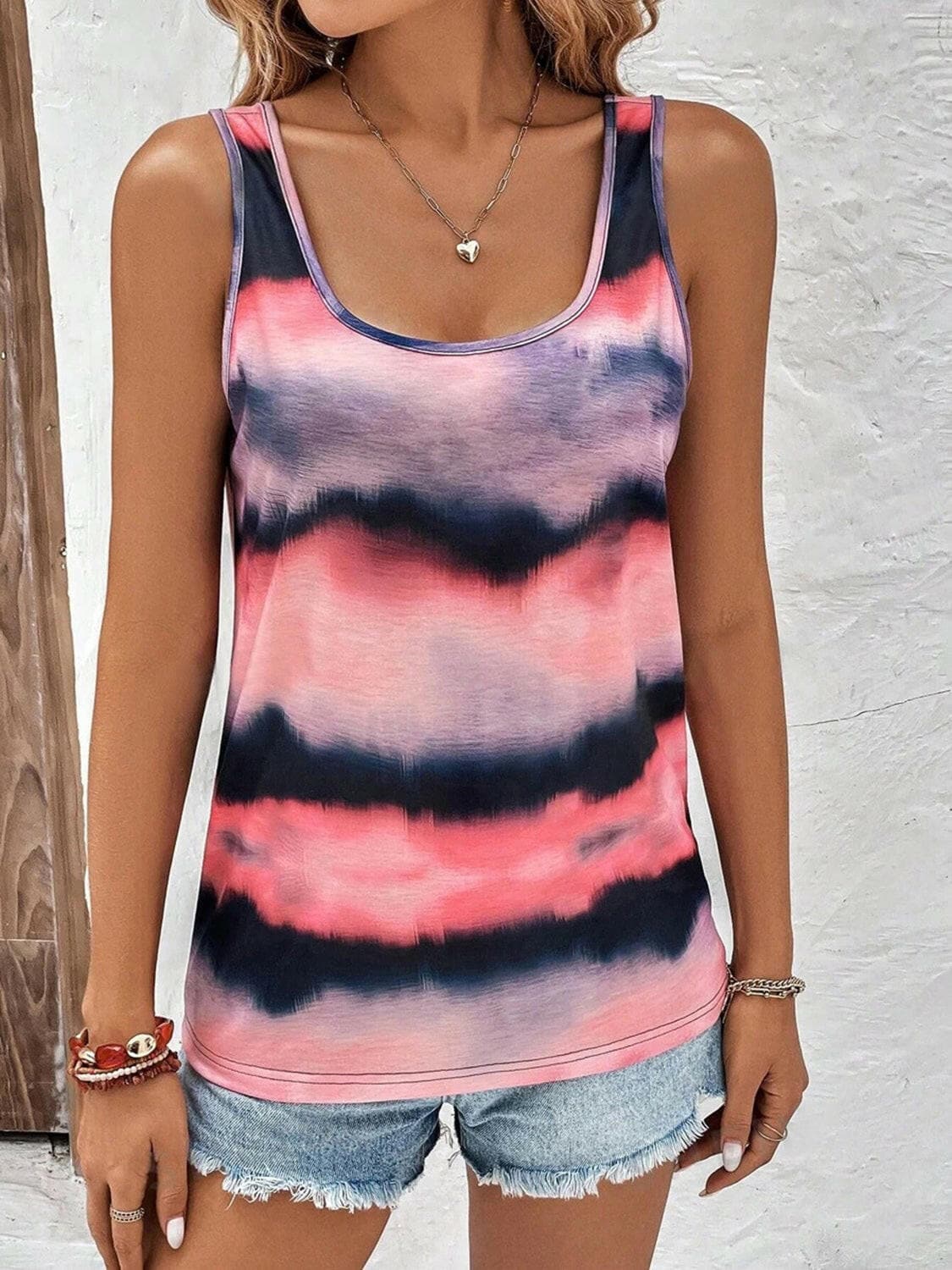 Vibrant tie-dye scoop neck wide strap tank top for women.