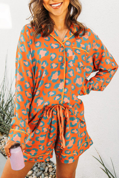 Leopard print loungewear set with long sleeves and shorts in vibrant orange