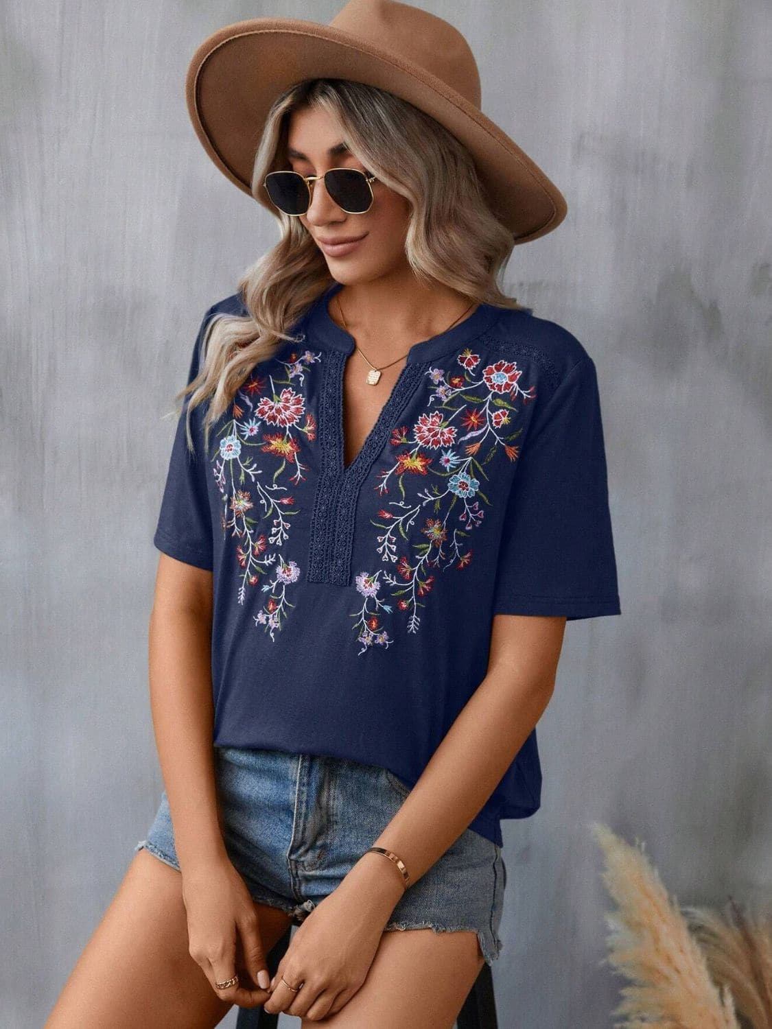 Embroidered Notched Short Sleeve T-Shirt.