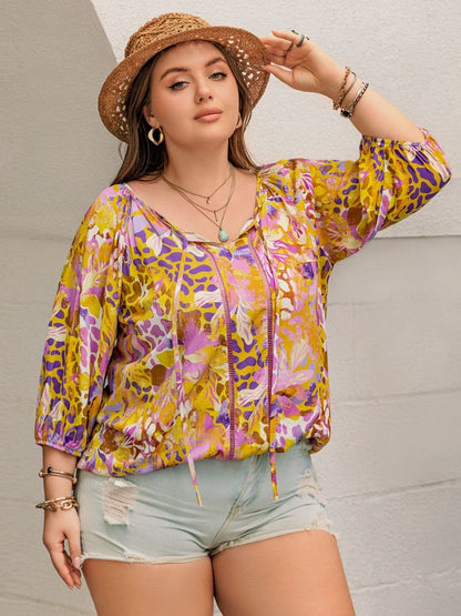 Plus Size Printed Tie Neck Blouse.