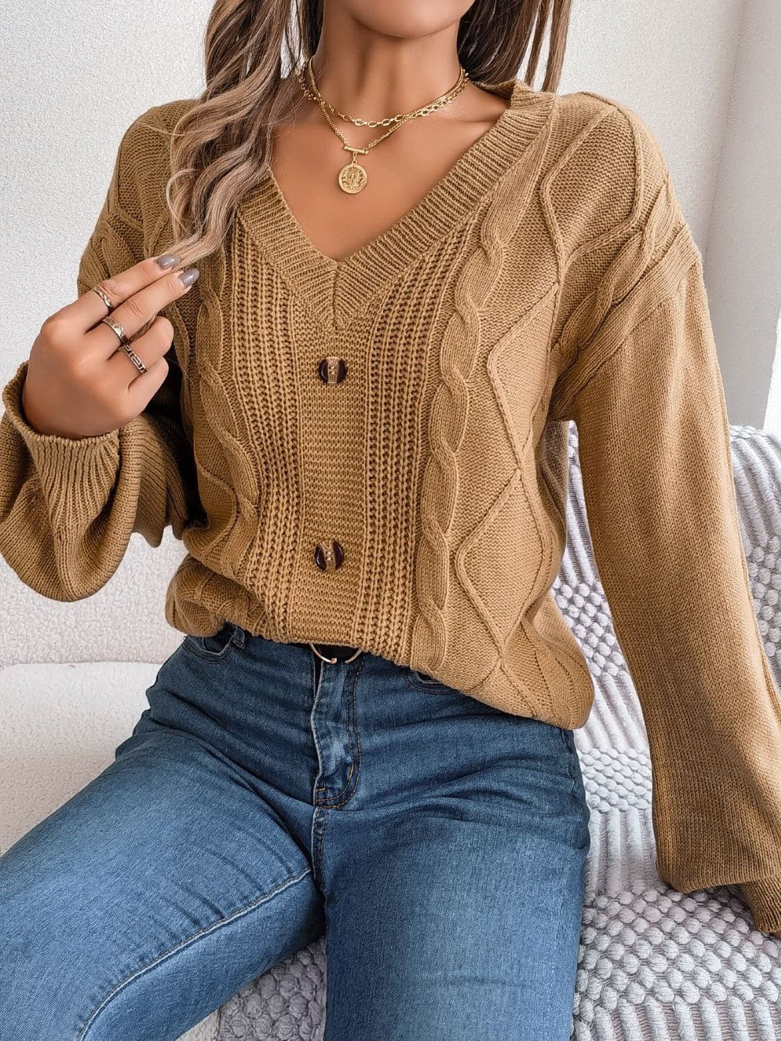 Cable-Knit Buttoned V-Neck Sweater.