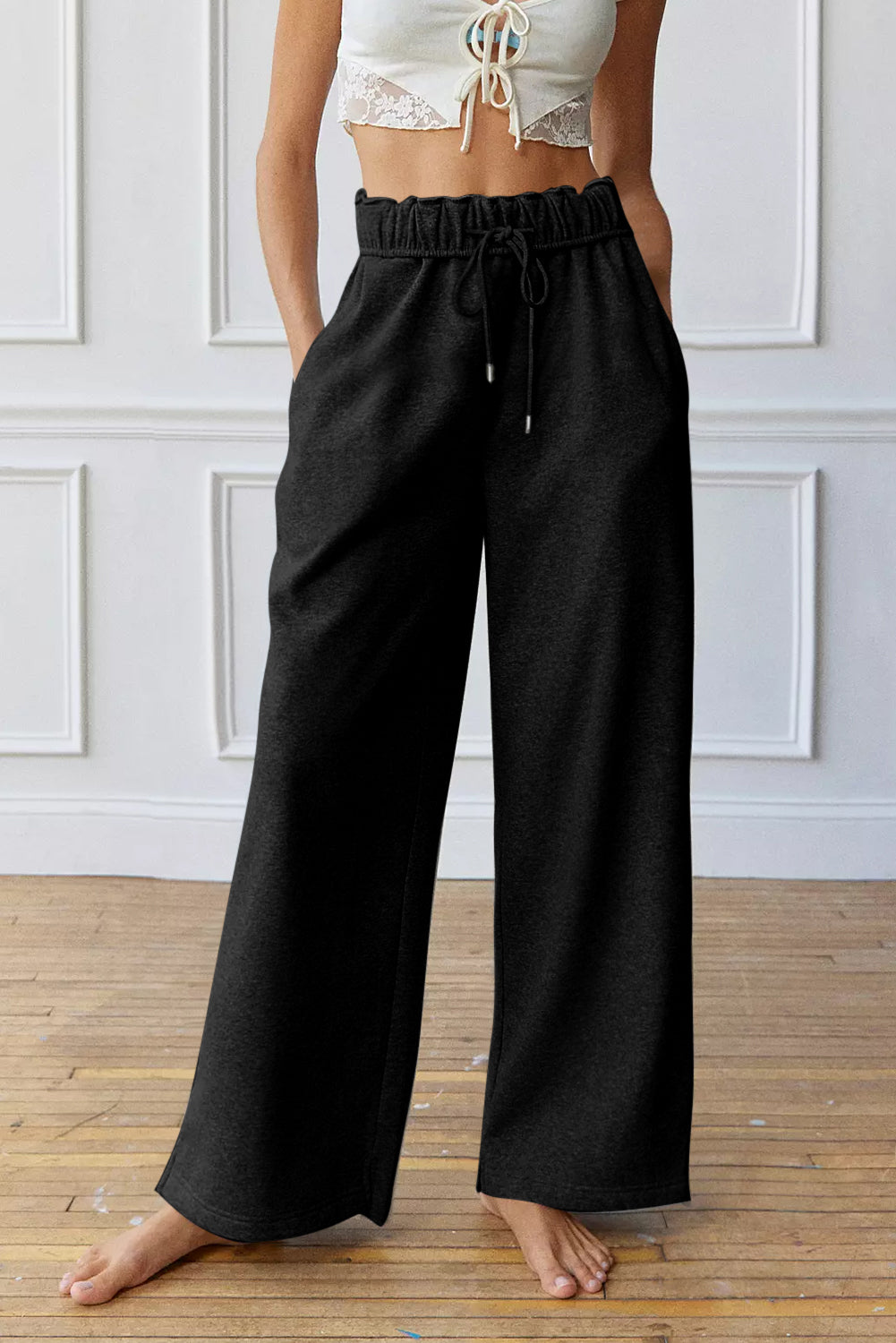 Elevate your style with black high-waist drawstring sweatpants