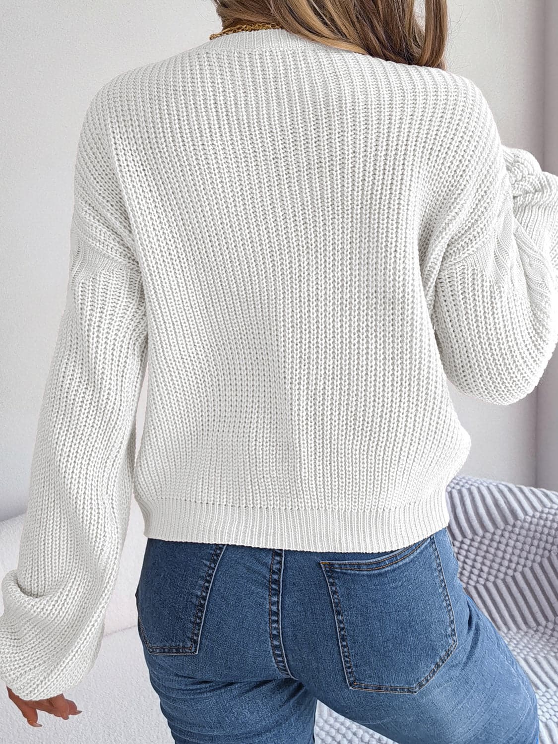 Cable-Knit Round Neck Drop Shoulder Sweater.