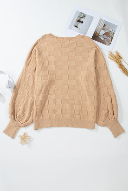 Cozy elegance: Light beige checkered textured knit sweater in plus sizes