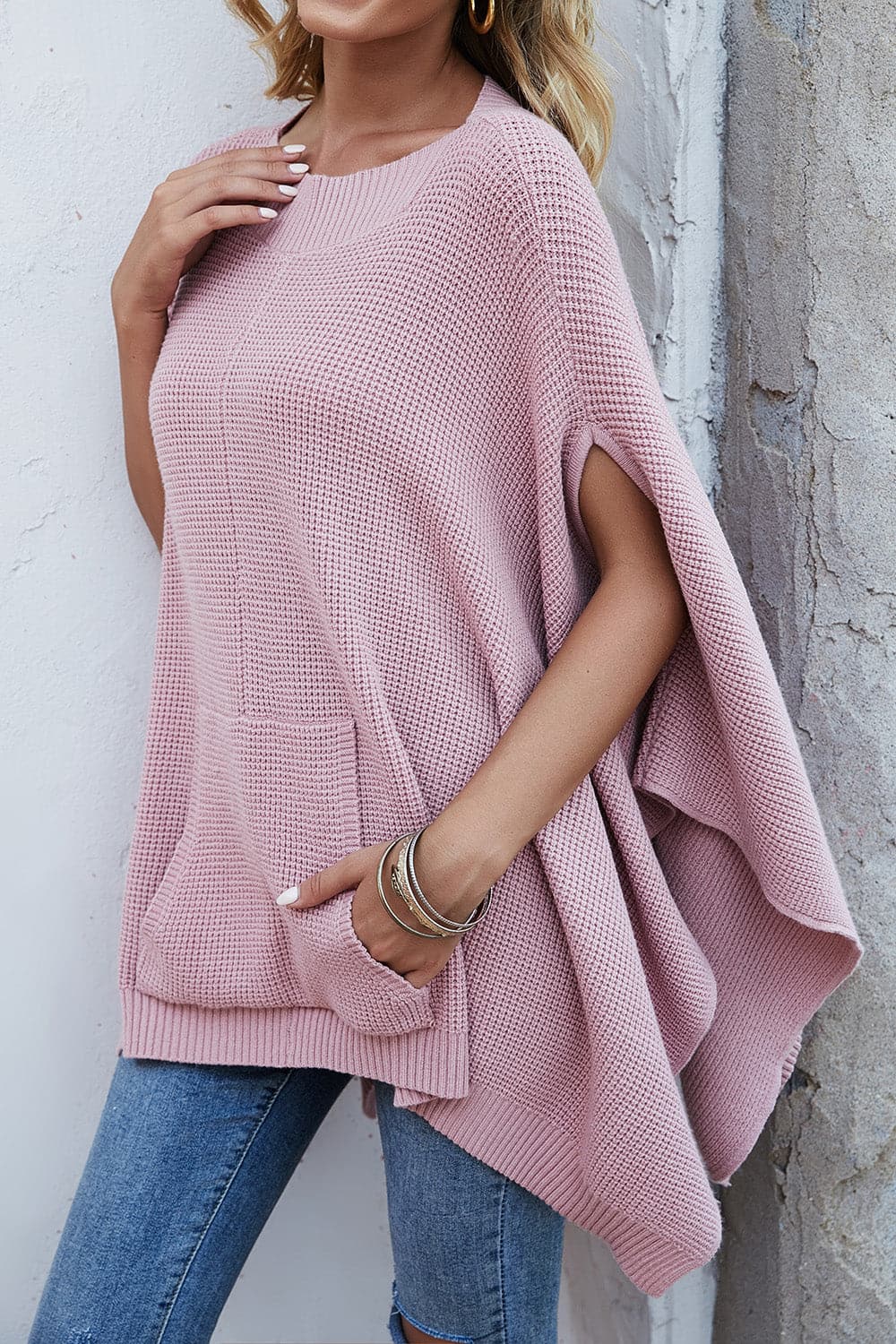 Waffle-Knit Pocketed Cape Sleeve Sweater.