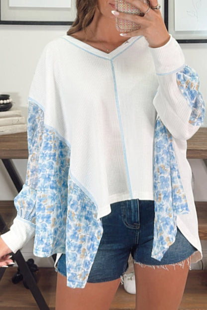 Chic white floral patchwork batwing blouse with V-neck design