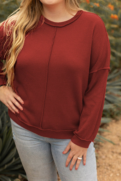 Chic plus size waffle knit top with exposed seam detail