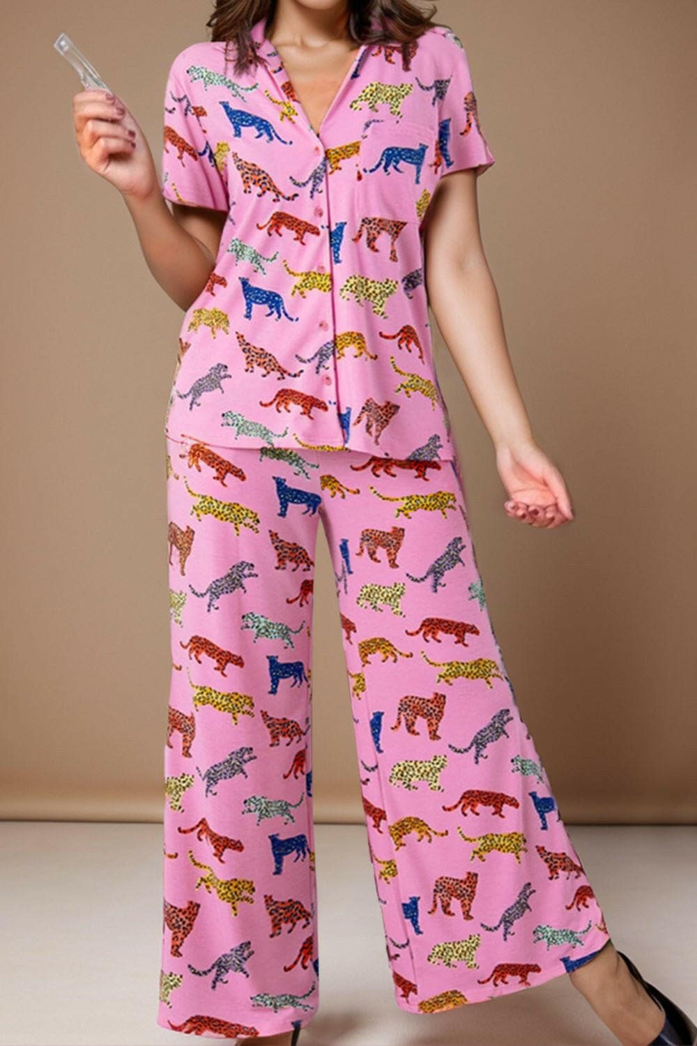 Chic Animal Print Lounge Wear Set with button-up top and matching pants, comfortable cotton-spandex blend.