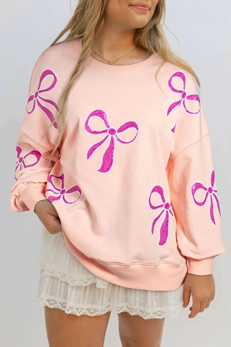 Apricot Pink Sequined Bowknot Drop Shoulder Oversized Sweatshirt - Love Salve 