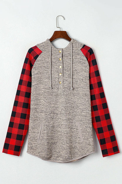 Plaid half snap long sleeve hoodie with chic design and comfortable fit.