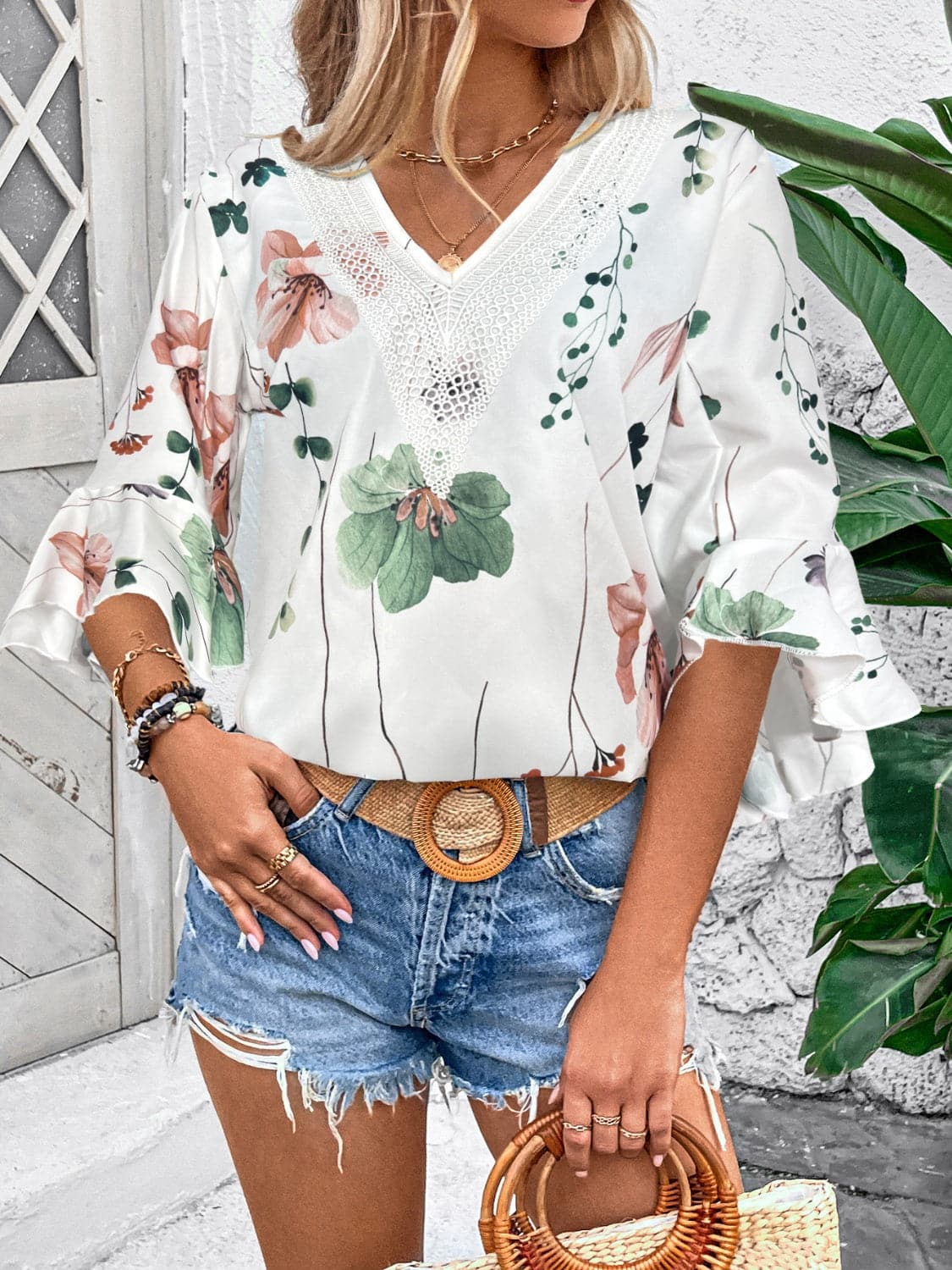 Ruffled Printed V-Neck Half Sleeve Blouse.