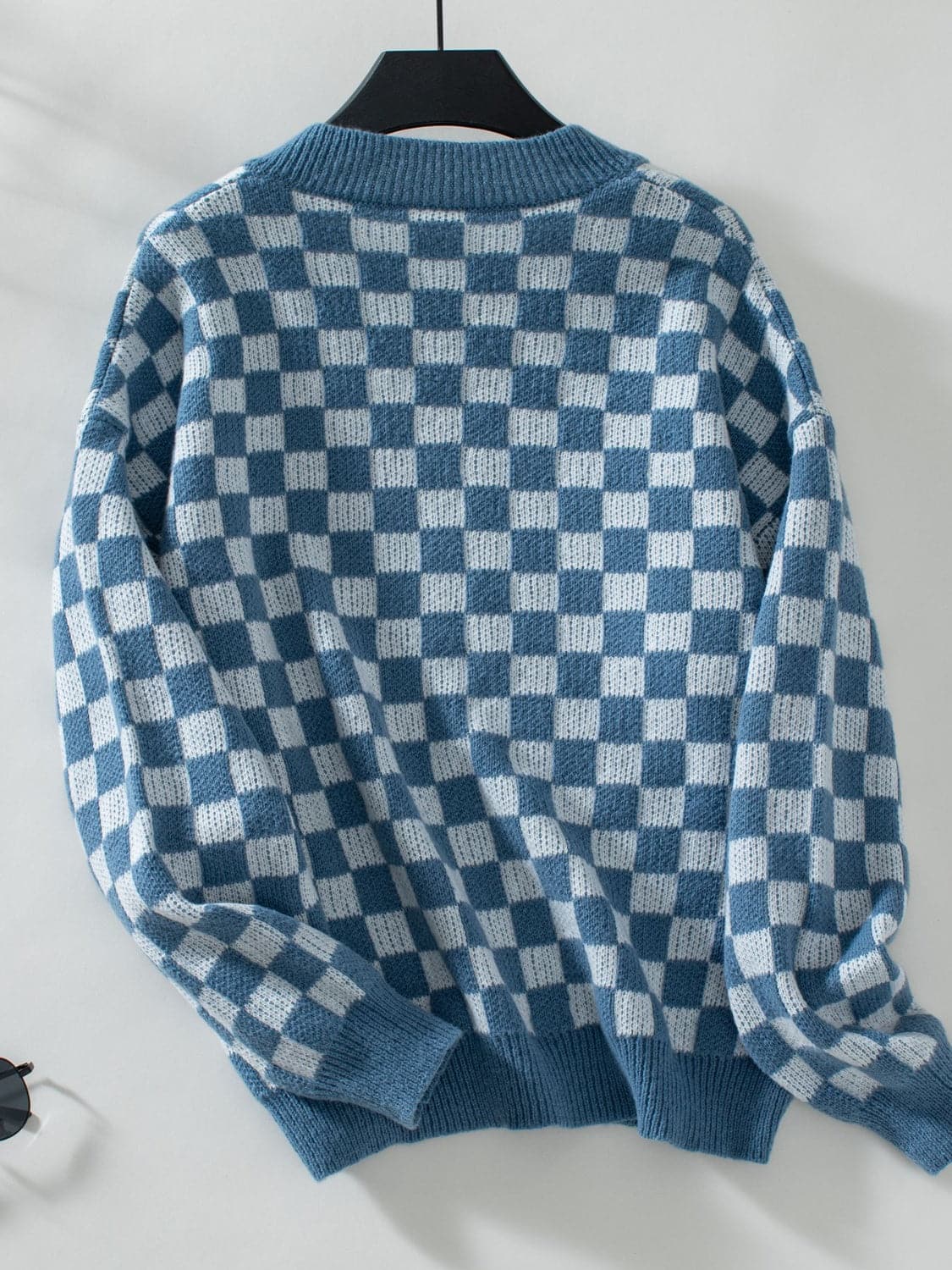 Vibrant checkered v-neck sweater with dropped shoulders