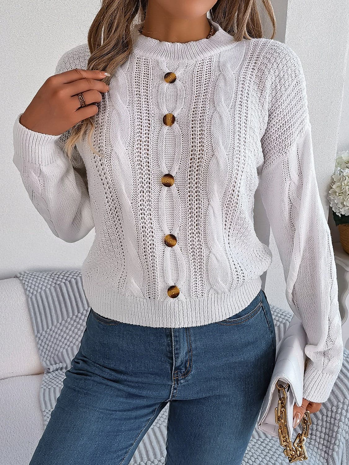 Cable-Knit Buttoned Round Neck Sweater.