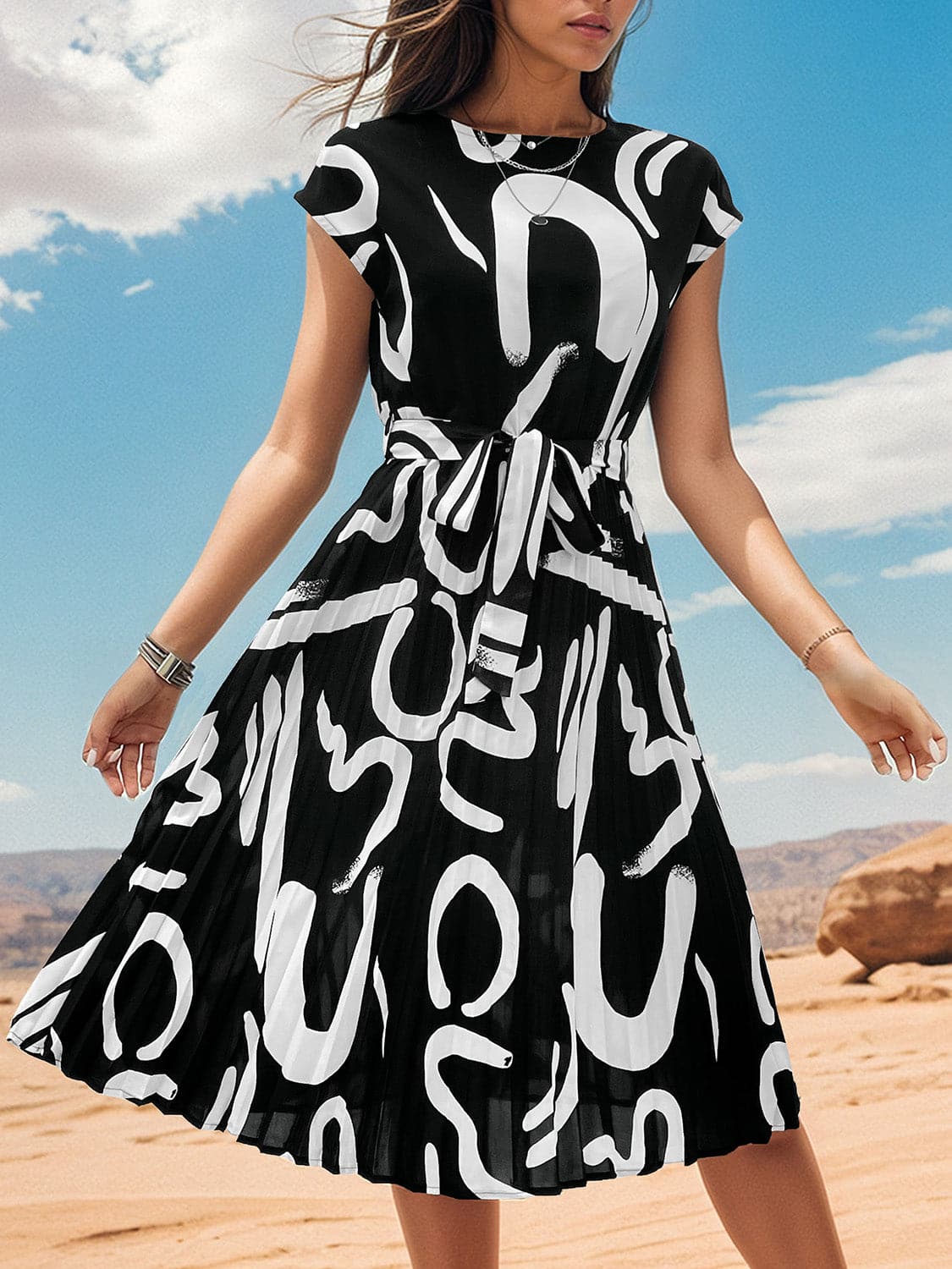 Printed Cap Sleeve Tie Waist Dress.