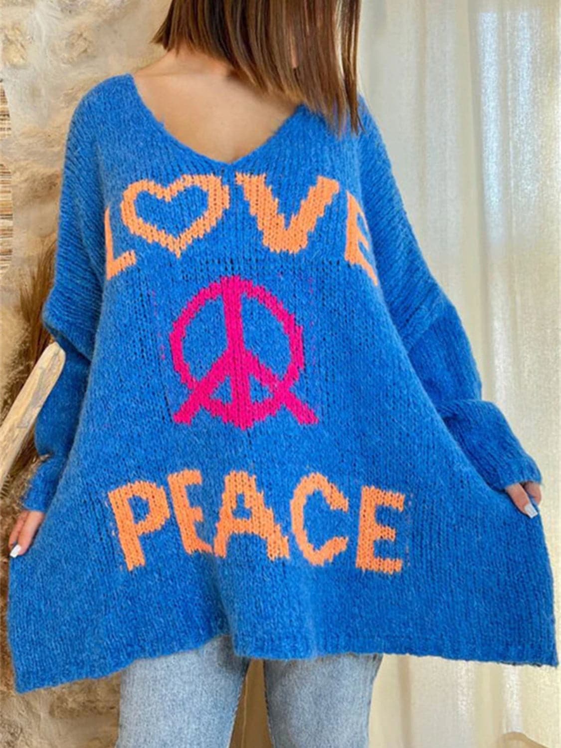 Peace Graphic V-Neck Long Sleeve Sweater.