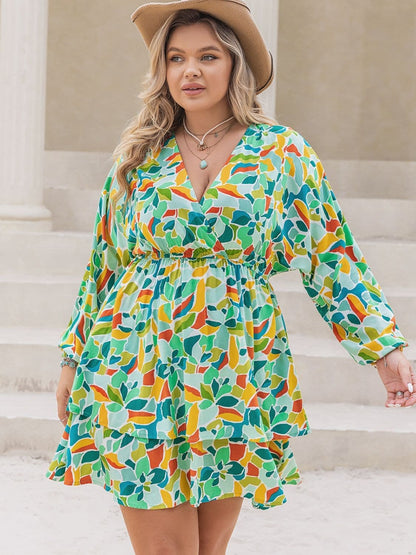 Plus Size Printed Surplice Long Sleeve Mini Dress.