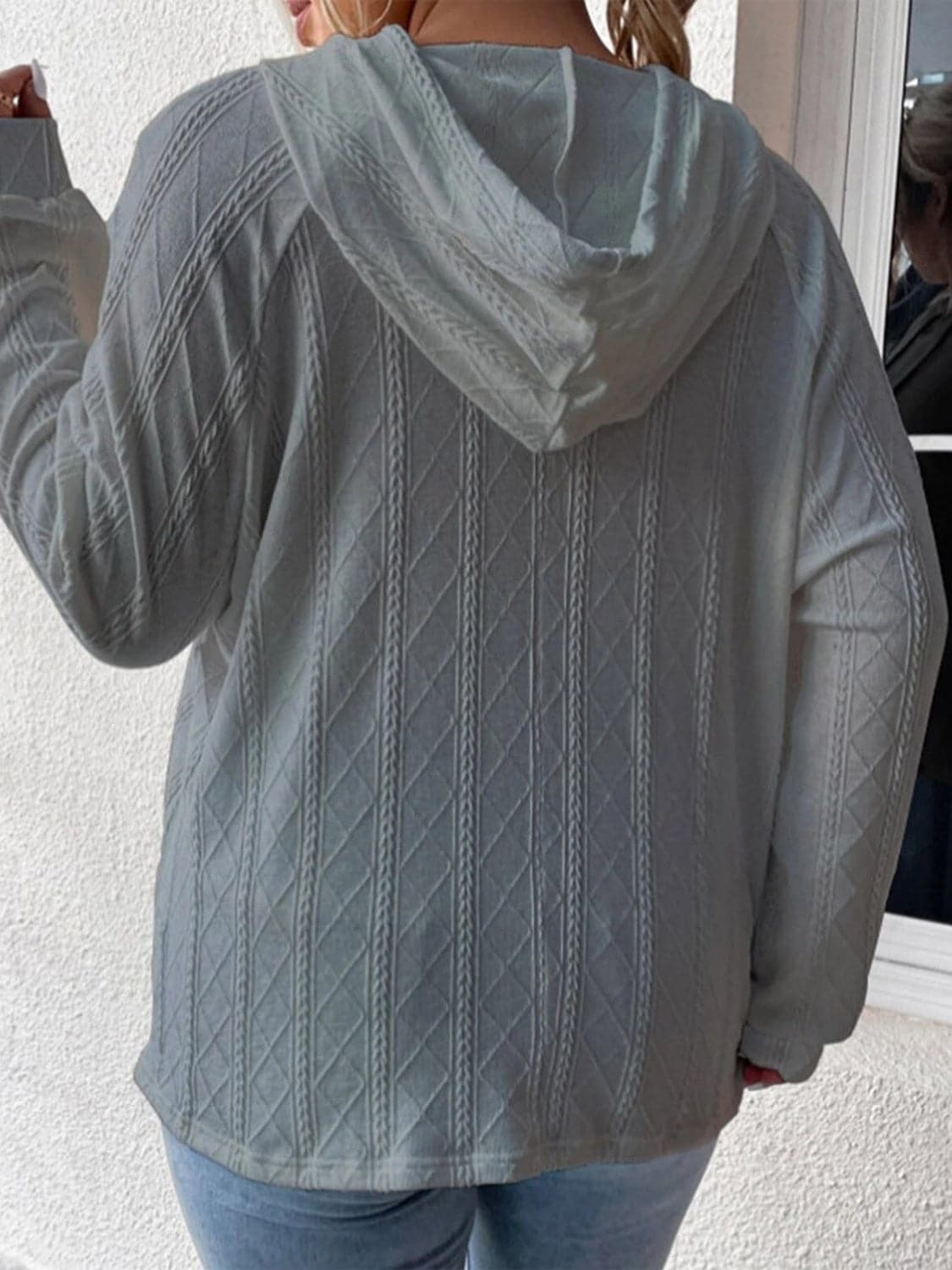 Cozy pocketed sheer hoodie with drawstring and long sleeves