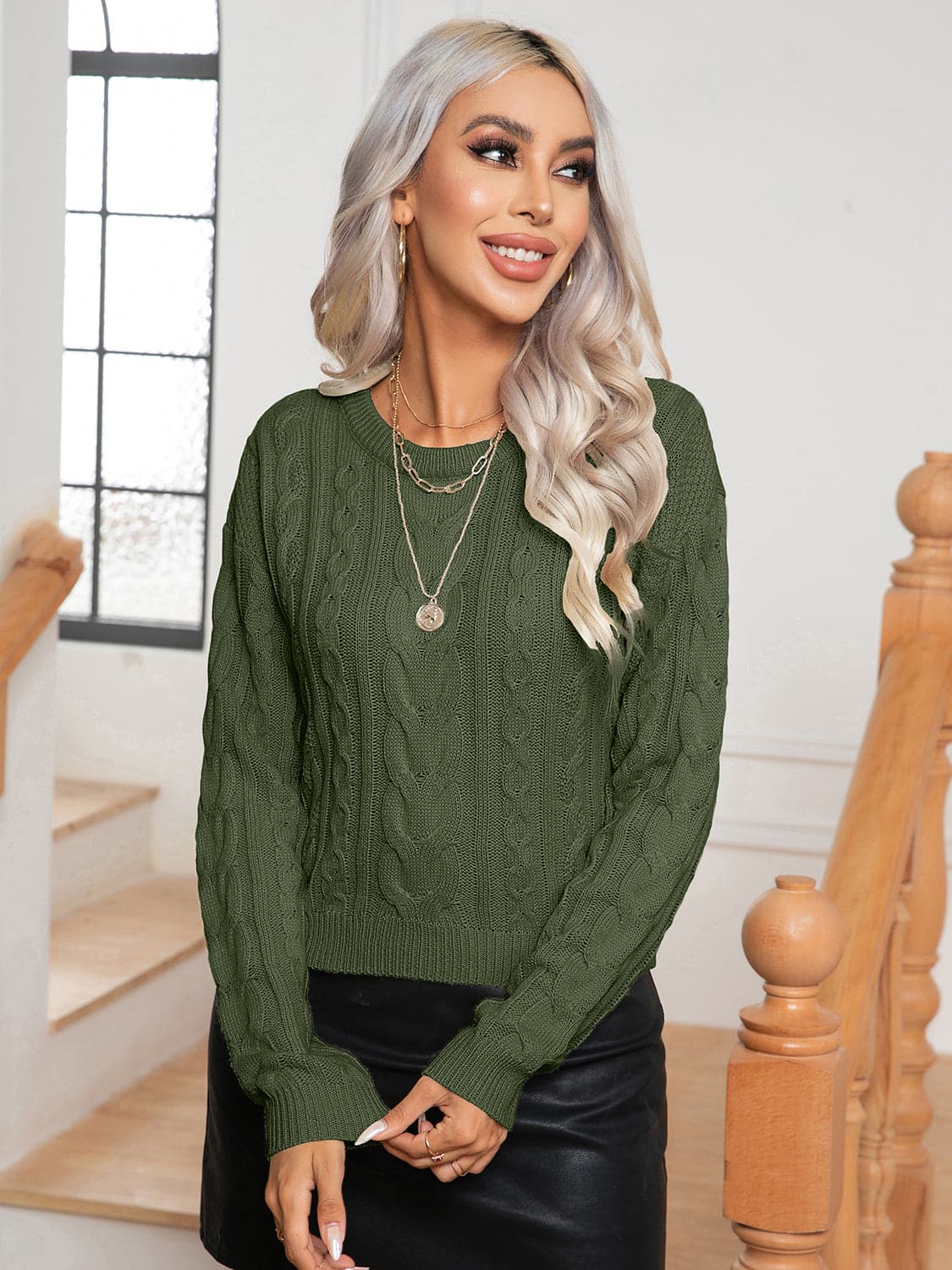 Cable-Knit Round Neck Long Sleeve Sweater.