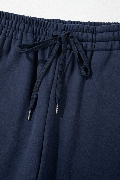 Navy blue fleece-lined casual pants with drawstring waist