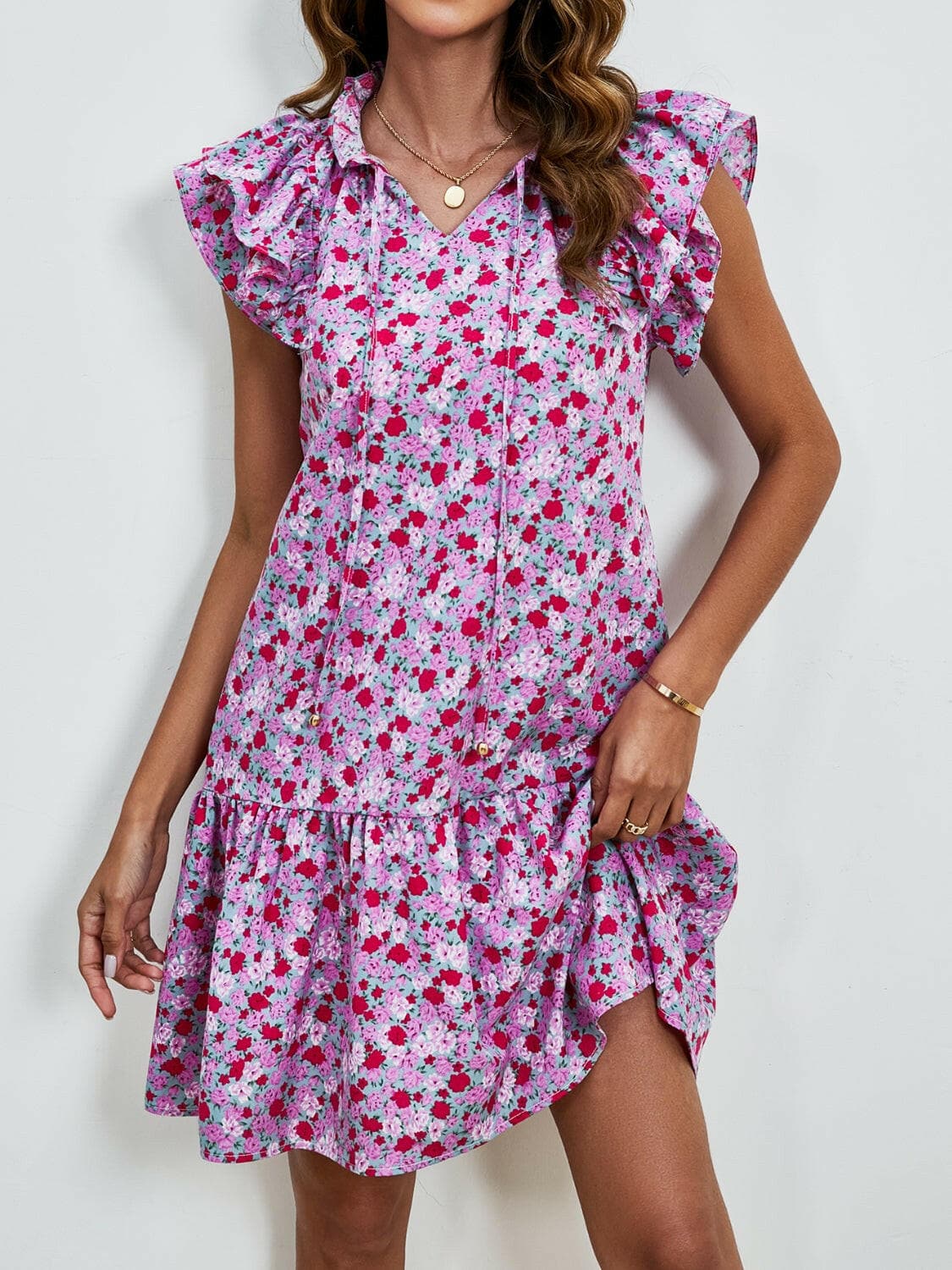 Tied Floral Cap Sleeve Mini Dress.