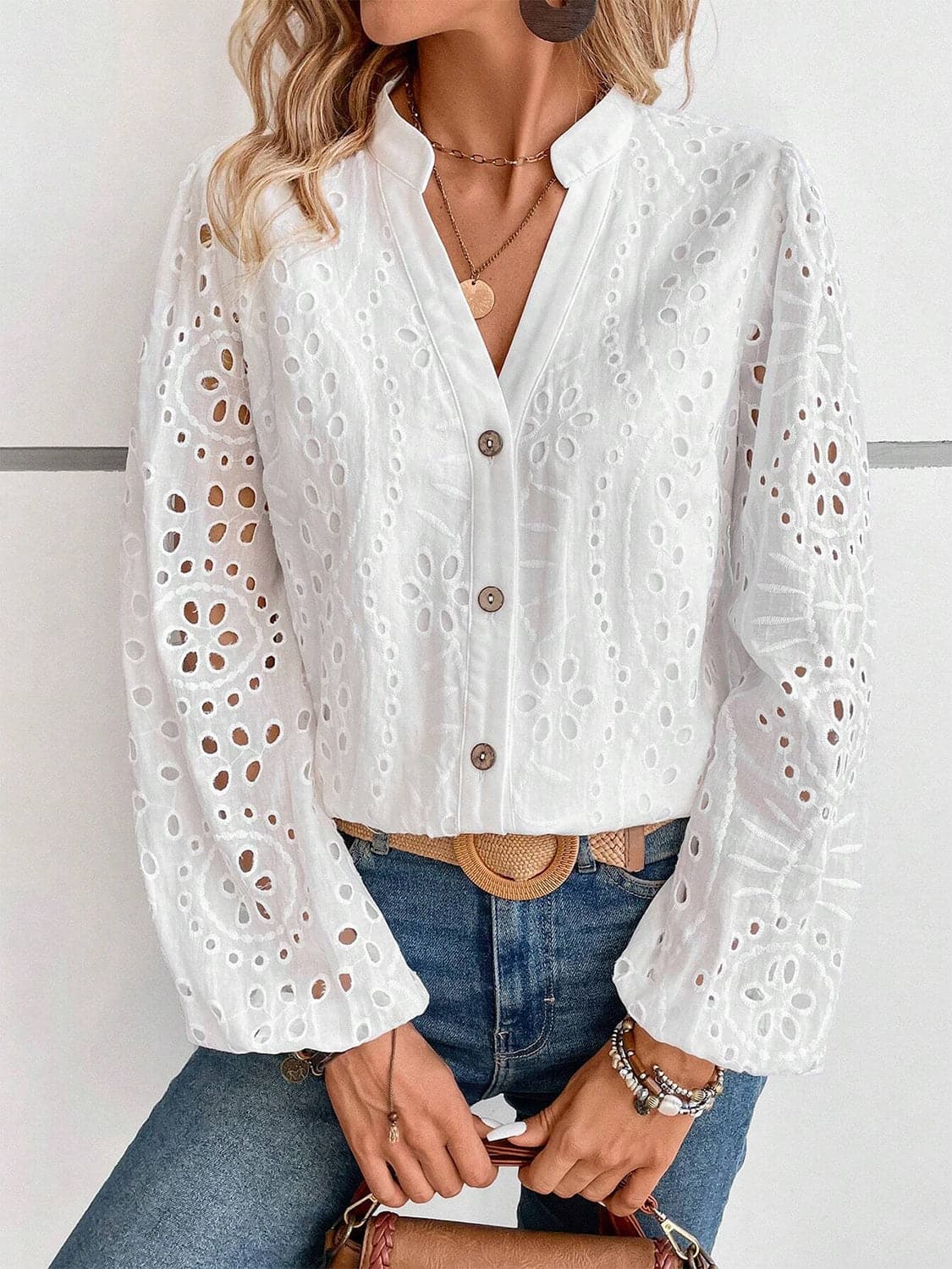 Cutout Notched Long Sleeve Blouse.