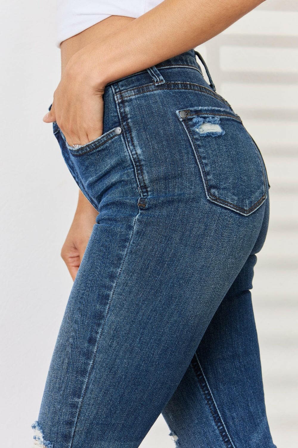 Judy Blue Full Size Mid Waist Distressed Slim Jeans.