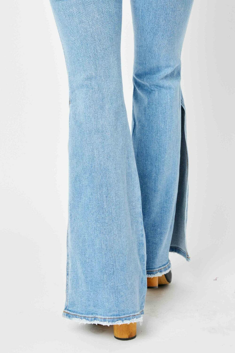 Judy Blue Full Size Mid Rise Raw Hem Slit Flare Jeans.