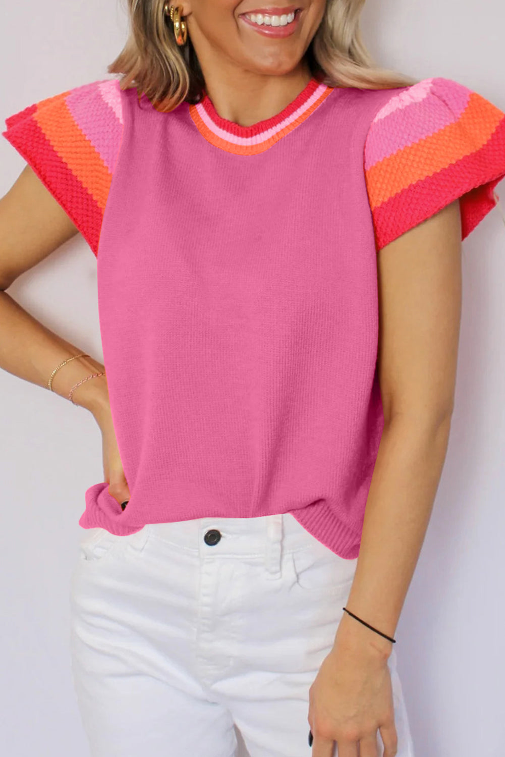 Chic bright pink knitted t-shirt with flutter sleeves