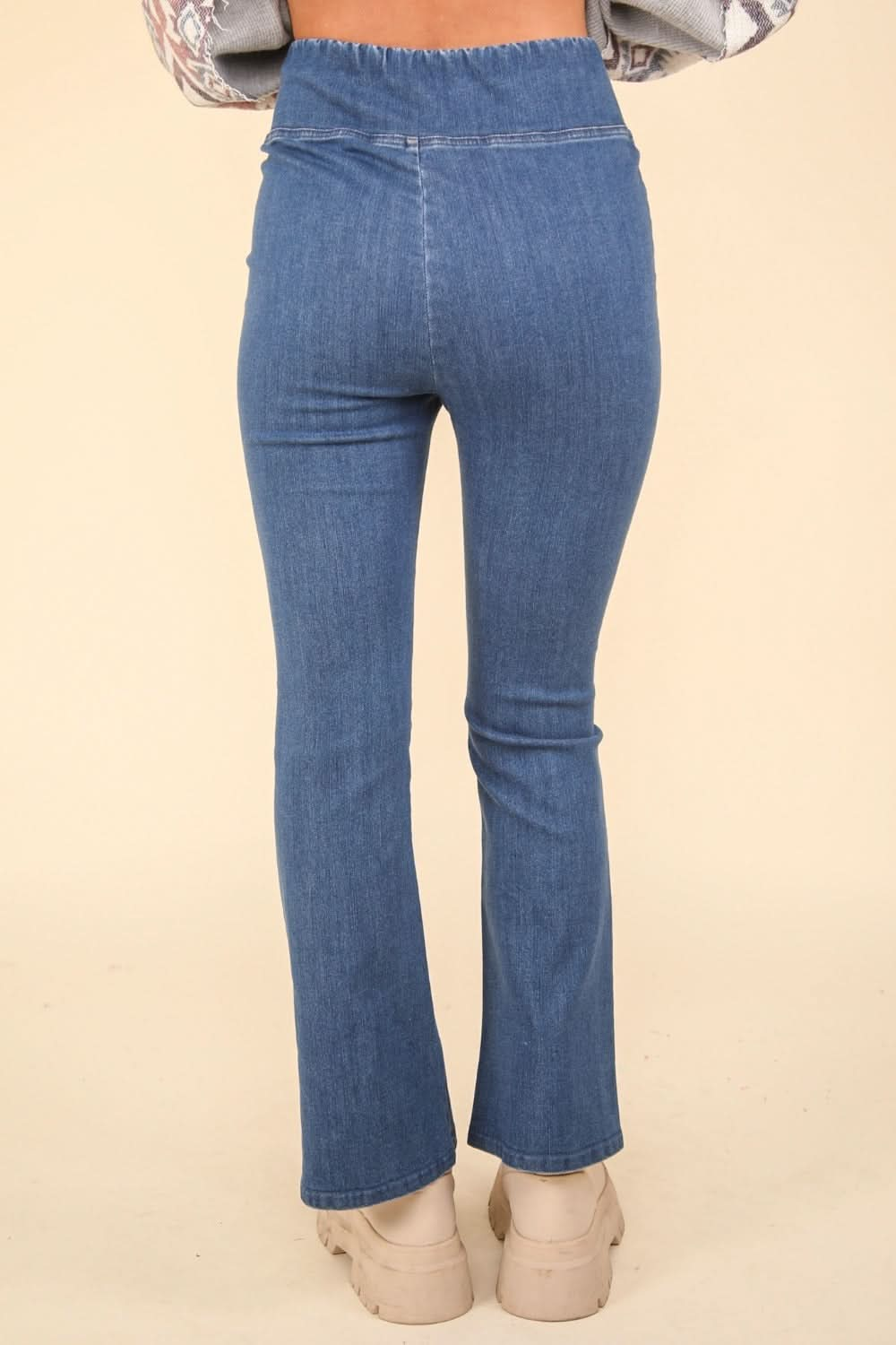 Washed denim crossover leggings