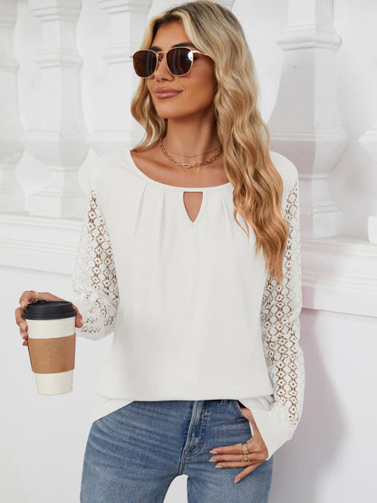 Cutout Round Neck Long Sleeve T-Shirt.